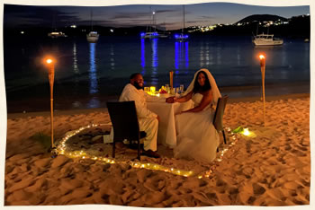 Beach dining for romantic wedding couple.