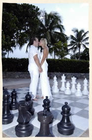 St. Thomas wedding couple at chess set Bluebeards Beach - St. Thomas