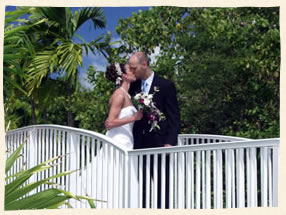 st thomas weddings - kiss on the bridge