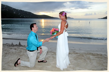 Groom on one knee at Magens Beach
