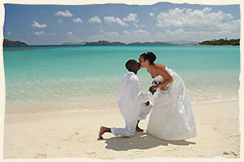 Kissing wedding couple just married Lindquist Beach St Thomas Virgin Islands