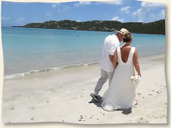 Couple walking Magens Beach after Vow Renewal