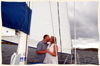 Married at sea couple on sailboat - Caribbean sea.