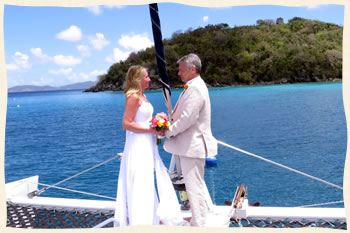 St. John Virgin Islands wedding couple exchanging vows on boat.