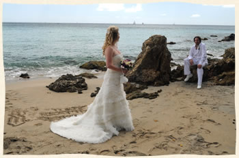 Groom looking lovingly at his newly wed bride - St. Thomas VI