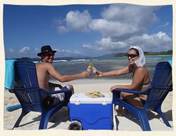 Wedding couple celebrating after their St. Thomas Beach Wedding with a picnic.