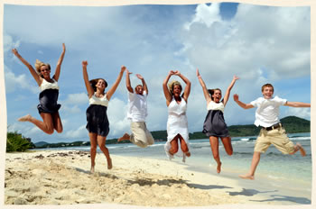 Lindquist beach wedding party jumping for joy.  St. Thomas VI