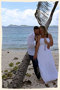 happy couple married on Hans Lollick via Helicopter