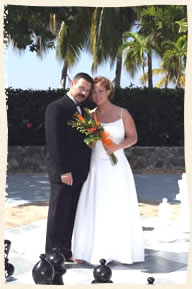 Wedding couple at chess set at Limetree, St. Thomas