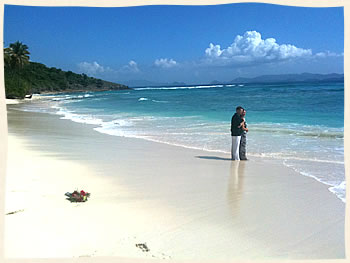 Newly marriedprivate island beach wedding