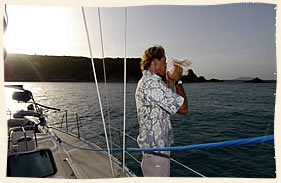 Captain Blowiing Conch Sailing Wedding