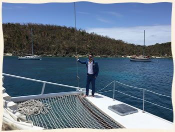 Groom waiting for biride for wedding ceremony on sailboat