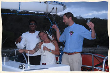 St. John wedding couple with captain.